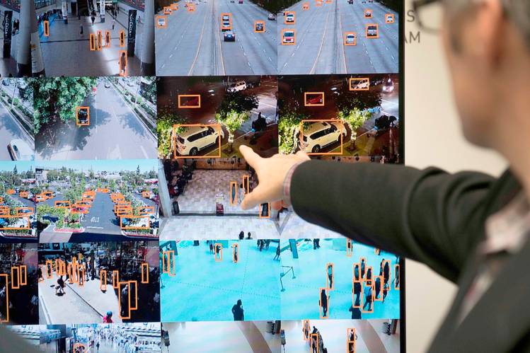 Nvidia demonstrated a law-enforcement system that recognizes vehicles and people at a Washington technology conference earlier this month. As sales of smartphones and PCs ease, chip makers such as Nvidia are developing processors for use in an artificial-intelligence market that is expanding dramatically.